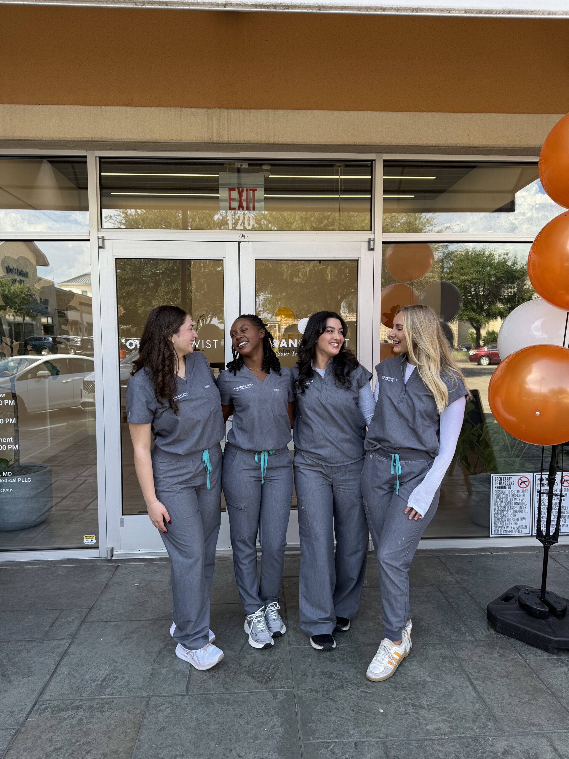 team laughing 3 scaled Highland Village